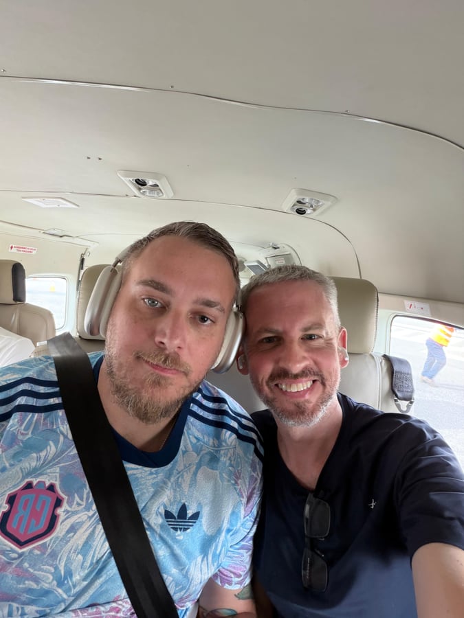 The two of us in the back of a small plane on a domestic flight